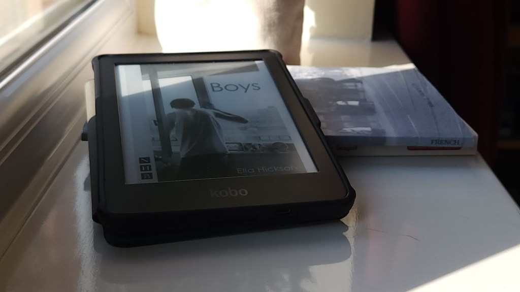 Photo of a Kobo eReader with the cover of Boys by Ella Hickson displayed