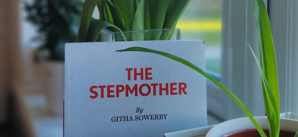 Play text of The Stepmother by Githa Sowerby in front of a vase of tulips.